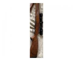 6 mm with Mauser action     3 x 9 Simmons Scope