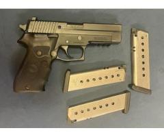 Sig Sauer Model 220  .45 ACP w/Crimson Trace Laser Grip