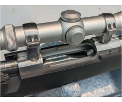 Stainless Ruger M77 MKII 7mm Magnum Leupold andTimney